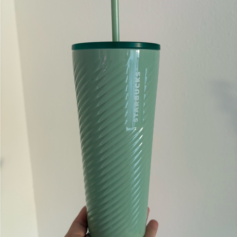 Light green metal Starbucks cup